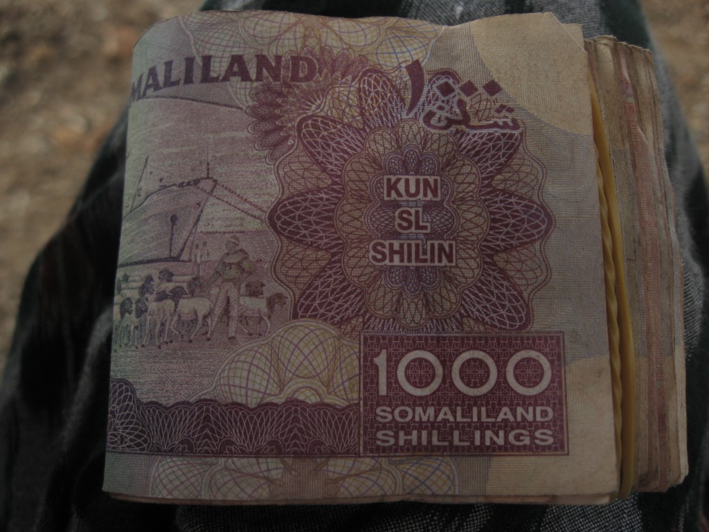 6,000 SOS (Somaliland Schillings) equal a dollar. The hens were about 25,000 and the roster was around 15,000